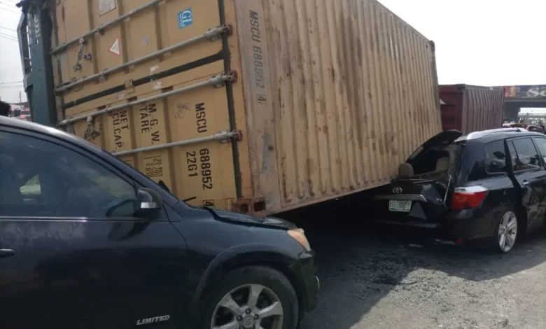 40-feet container falls on three cars in Lagos